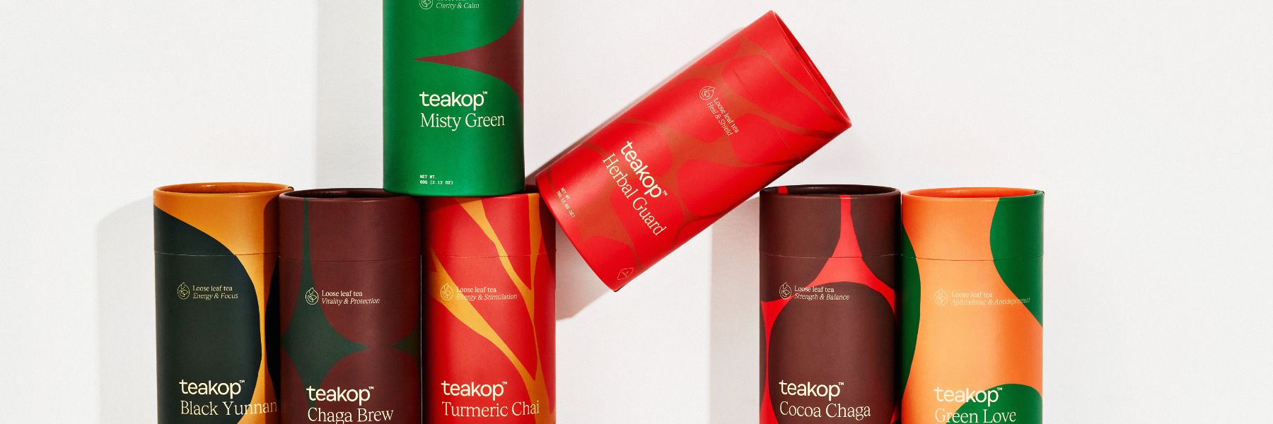 teakop tea tins styled on a shelf